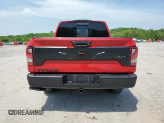 2020 Nissan Titan SL z VIN 1N6AA1ED8LN509339, wystawiony jako Copart lot #54925325 z przebiegiem 88 310 mil mil oraz Szkody całkowita. Historia ofert i sprzedaży dostępna na DreamBid. Obrazek 6.