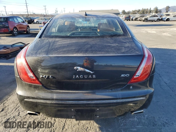 2013 Jaguar XJ with VIN SAJWA2GB0DLV43865, listed as a Copart auction lot 79693934 with 0 mi miles and Salvage Title. Bid and sale history available at carsss.com. Image 6.