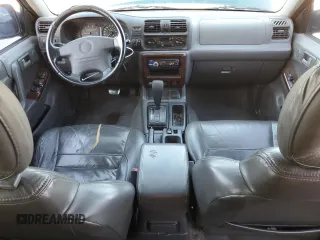 1999 Isuzu Rodeo S с VIN 4S2CK58W6X4352441, выставлен на аукционе Copart как лот 81915384 с пробегом 338 513 миль миль и На запчасти • Non repairable. История ставок и продаж доступна на DreamBid. Изображение 8.