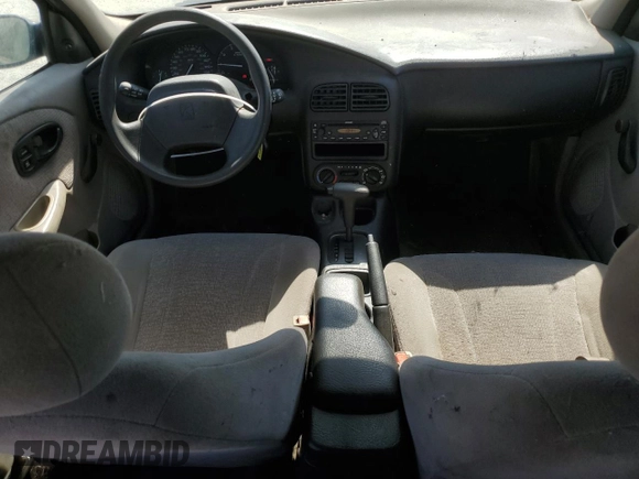 2002 Saturn SL with VIN 1G8ZK52712Z291884, listed as a Copart auction lot 66075874 with 62,275 mi miles and Salvage Title. Bid and sale history available at carsss.com. Image 8.