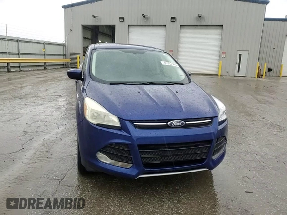 2016 Ford Escape SE with VIN 1FMCU9GX9GUC26772, listed as a Copart auction lot 45337945 with 112,822 mi miles and Salvage Title. Bid and sale history available at DreamBid. Image 14.