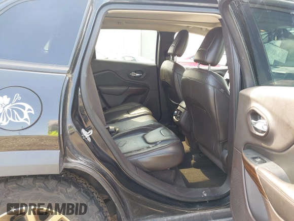2014 Jeep Cherokee Trailhawk with VIN 1C4PJMBS6EW100500, listed as a IAAI auction lot 41894989 with 131,034 mi miles. Bid and sale history available at carsss.com. Image 8.