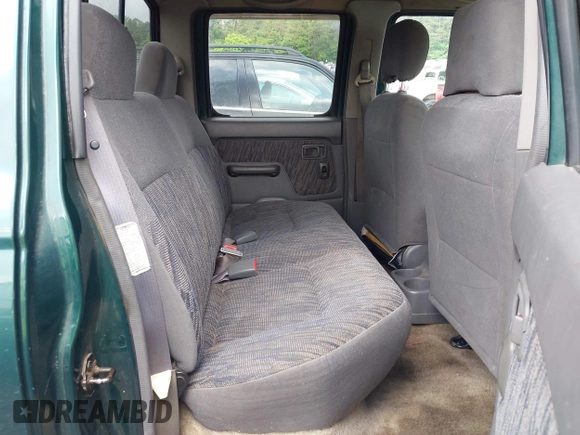2000 Nissan Frontier XE with VIN 1N6ED27T5YC429406, listed as a IAAI auction lot 42150671 with 303,869 mi miles and . Bid and sale history available at DreamBid. Image 8.