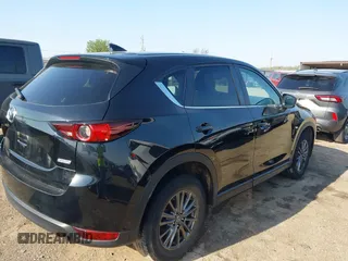 2019 Mazda CX-5 Touring with VIN JM3KFACM6K0533203, listed as a IAAI auction lot 41973125 with 106,882 mi miles and . Bid and sale history available at carsss.com. Image 4.