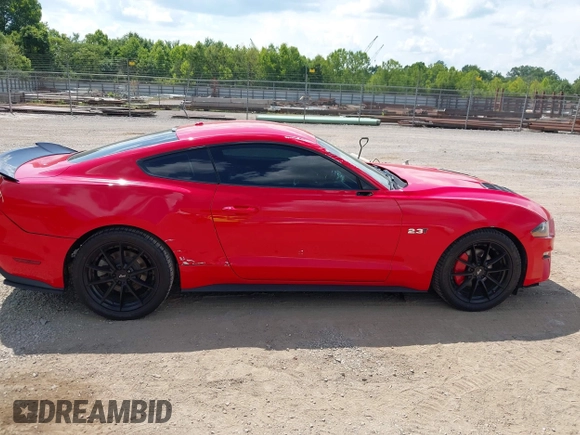 2019 Ford Mustang EcoBoost z VIN 1FA6P8TH9K5124317, wystawiony jako IAAI lot #42627934 z przebiegiem 39 869 mil mil oraz . Historia ofert i sprzedaży dostępna na DreamBid. Obrazek 13.