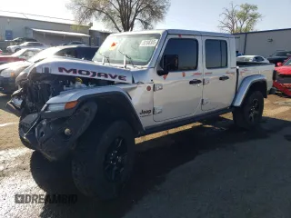 2023 Jeep Gladiator Mojave z VIN 1C6JJTEG9PL587727, wystawiony jako Copart lot #52098305 z przebiegiem 28 776 mil mil oraz Szkoda całkowita • Salvage title. Historia ofert i sprzedaży dostępna na DreamBid. Obrazek 1.