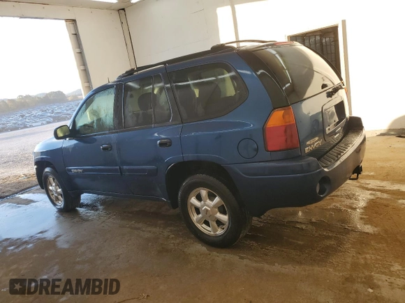 2005 GMC Envoy SLT with VIN 1GKDS13S652339845, listed as a Copart auction lot 77693684 with 220,306 mi miles and Salvage Title. Bid and sale history available at carsss.com. Image 2.