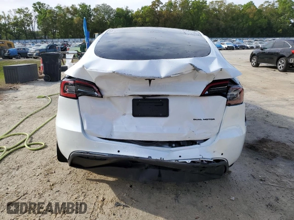 2022 Tesla Model Y Long Range with VIN 7SAYGDEE4NF398710, listed as a Copart auction lot 50510375 with 46,430 mi miles and Non Repairable. Bid and sale history available at DreamBid. Image 6.