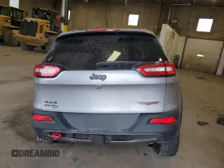 2014 Jeep Cherokee Trailhawk with VIN 1C4PJMBSXEW213981, listed as a Copart auction lot 60440495 with 136,612 mi miles and Salvage title. Bid and sale history available at DreamBid. Image 6.