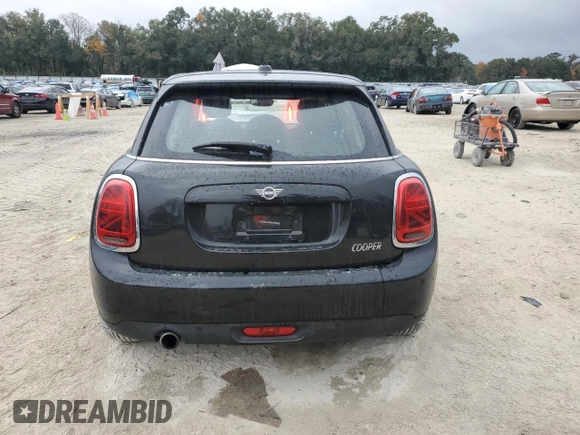 2021 MINI Hardtop 4 Door Oxford Edition with VIN WMWXU7C08M2N64039, listed as a Copart auction lot 83329254 with 31,549 mi miles and Non repairable. Bid and sale history available at DreamBid. Image 6.