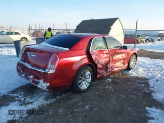 2012 Chrysler 300 Limited with VIN 2C3CCACG0CH205728, listed as a IAAI auction lot 41285693 with 125,204 mi miles. Bid and sale history available at carsss.com. Image 4.