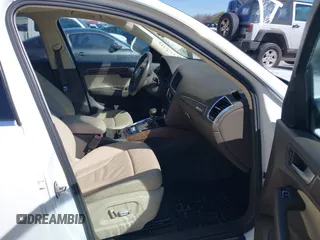 2014 Audi Q5 Premium Plus with VIN WA1LFAFP1EA051704, listed as a IAAI auction lot 41725317 with 136,084 mi miles. Bid and sale history available at carsss.com. Image 5.