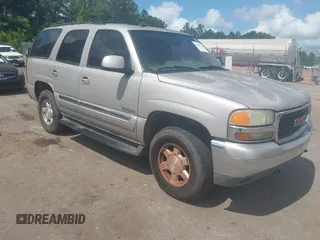 2004 GMC Yukon SLT z VIN 1GKEC13Z64J279536, wystawiony jako IAAI lot #42300904 z przebiegiem 309 306 mil mil oraz . Historia ofert i sprzedaży dostępna na DreamBid. Obrazek 1.