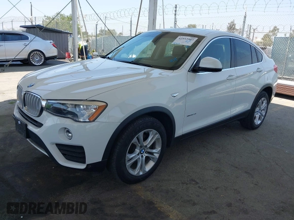 2015 BMW X4 xDrive28i with VIN 5UXXW3C5XF0M89259, listed as a IAAI auction lot 42553903 with 98,960 mi miles and . Bid and sale history available at DreamBid. Image 18.