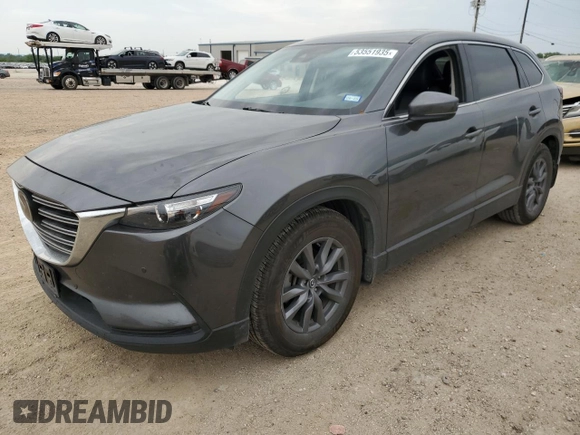 2021 Mazda CX-9 Touring z VIN JM3TCACY1M0502783, wystawiony jako Copart lot #53551935 z przebiegiem 71 373 mil mil oraz Czysty tytuł • Clean title. Historia ofert i sprzedaży dostępna na DreamBid. Obrazek 1.