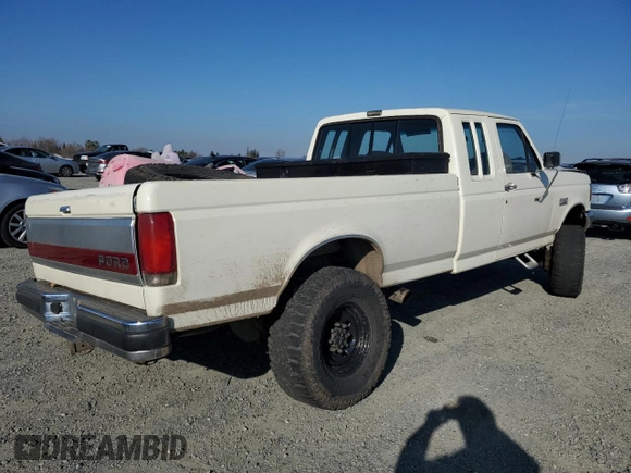 1991 Ford F-250 with VIN 1FTHX26M1MKA14231, listed as a Copart auction lot 41796005 with 6,983 mi miles and Salvage title. Bid and sale history available at DreamBid. Image 3.