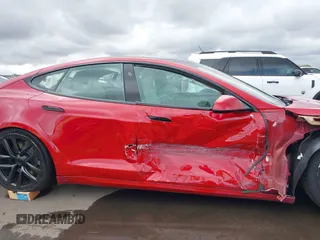2022 Tesla Model S Plaid z VIN 5YJSA1E61NF485055, wystawiony jako IAAI lot #41751134 z przebiegiem Nie podano mil oraz . Historia ofert i sprzedaży dostępna na DreamBid. Obrazek 13.