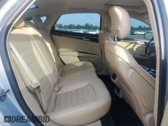 2013 Ford Fusion SE Hybrid z VIN 3FA6P0LU7DR368711, wystawiony jako Copart lot #62367685 z przebiegiem 155 284 mil mil oraz Czysty tytuł • Clean title. Historia ofert i sprzedaży dostępna na DreamBid. Obrazek 10.