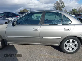 2006 Nissan Sentra S z VIN 3N1CB51D56L514396, wystawiony jako IAAI lot #41591034 z przebiegiem 350 322 mil mil oraz . Historia ofert i sprzedaży dostępna na DreamBid. Obrazek 15.