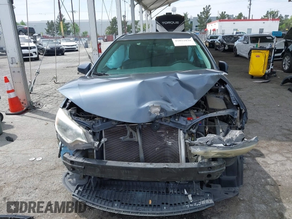 2016 Toyota Corolla L with VIN 5YFBURHE3GP523871, listed as a IAAI auction lot 42022838 with 82,723 mi miles and . Bid and sale history available at DreamBid. Image 13.