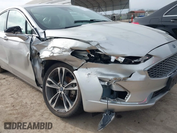 2019 Ford Fusion Titanium with VIN 3FA6P0D9XKR206465, listed as a IAAI auction lot 41577306 with 70,668 mi miles. Bid and sale history available at carsss.com. Image 6.