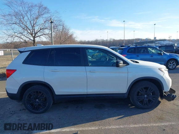 2021 Honda Passport Sport with VIN 5FNYF8H21MB031674, listed as a IAAI auction lot 41739769 with 36,894 mi miles and . Bid and sale history available at DreamBid. Image 13.