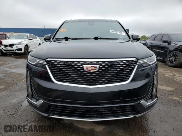 2022 Cadillac XT6 Premium Luxury z VIN 1GYKPDRSXNZ161744, wystawiony jako Copart lot #54901995 z przebiegiem 24 994 mil mil oraz Szkoda całkowita • Salvage title. Historia ofert i sprzedaży dostępna na DreamBid. Obrazek 5.