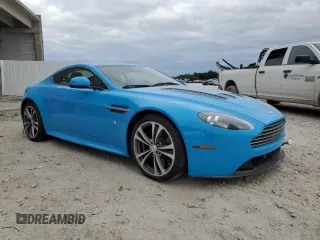 2011 Aston Martin V12 Vantage Carbon Black with VIN SCFEBBCF6BGS00579, listed as a Copart auction lot 79911294 with 34,191 mi miles and Salvage Title. Bid and sale history available at carsss.com. Image 4.
