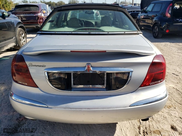 2001 Lincoln Continental with VIN 1LNHM97V31Y641106, listed as a Copart auction lot 77468194 with 86,363 mi miles and Clean Title. Bid and sale history available at carsss.com. Image 6.