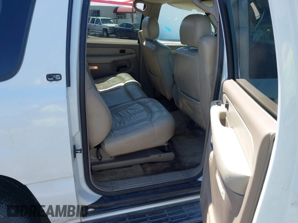 2002 Chevrolet Suburban LT with VIN 1GNEC16Z82J196802, listed as a IAAI auction lot 42284723 with 310,843 mi miles and . Bid and sale history available at DreamBid. Image 8.