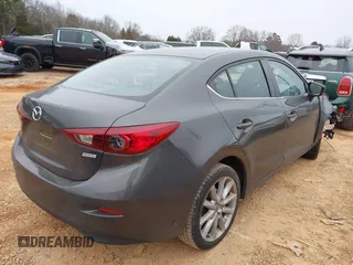2017 Mazda 3 Touring z VIN JM1BN1V77H1101001, wystawiony jako IAAI lot #41393592 z przebiegiem 77 566 mil mil oraz . Historia ofert i sprzedaży dostępna na DreamBid. Obrazek 4.