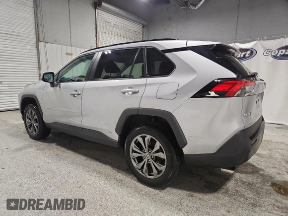 2022 Toyota RAV4 Hybrid XLE Premium with VIN 4T3B6RFV1NU080099, listed as a Copart auction lot 60206905 with 59,859 mi miles and Clean title. Bid and sale history available at DreamBid. Image 2.
