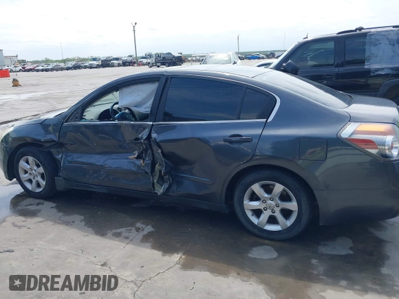 2009 Nissan Altima 2.5 z VIN 1N4AL21E69N560192, wystawiony jako IAAI lot #42030783 z przebiegiem 179 859 mil mil oraz . Historia ofert i sprzedaży dostępna na DreamBid. Obrazek 14.