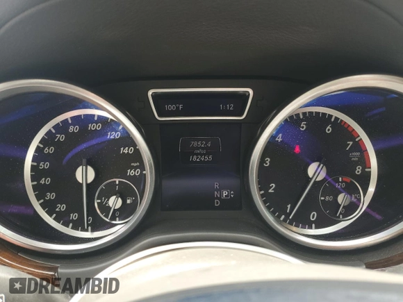 2014 Mercedes-Benz GL 450 z VIN 4JGDF7CE0EA303471, wystawiony jako Copart lot #58673045 z przebiegiem 182 455 mil mil oraz Tytuł czysty. Historia ofert i sprzedaży dostępna na DreamBid. Obrazek 9.