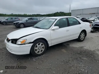 2000 Toyota Camry CE z VIN JT2BG28KXY0432024, wystawiony jako Copart lot #57057905 z przebiegiem 201 289 mil mil oraz Szkoda całkowita • Salvage title. Historia ofert i sprzedaży dostępna na DreamBid. Obrazek 1.