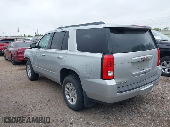 2015 GMC Yukon SLT z VIN 1GKS1BKC0FR172661, wystawiony jako IAAI lot #41911331 z przebiegiem 171 815 mil mil oraz . Historia ofert i sprzedaży dostępna na DreamBid. Obrazek 3.