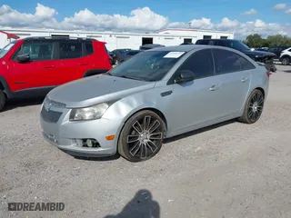 2014 Chevrolet Cruze LS with VIN 1G1PB5SH7E7425814, listed as a IAAI auction lot 41455029 with 103,427 mi miles. Bid and sale history available at carsss.com. Image 2.