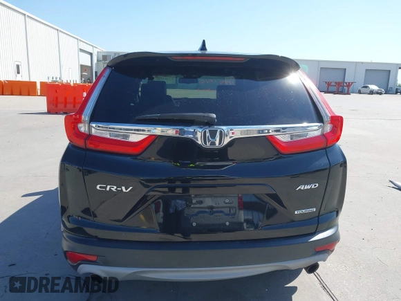 2018 Honda CR-V Touring with VIN 2HKRW2H91JH630702, listed as a IAAI auction lot 41983516 with 84,355 mi miles. Bid and sale history available at carsss.com. Image 16.