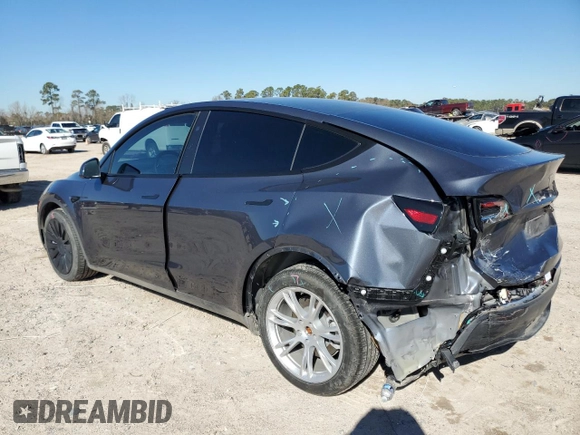 2023 Tesla Model Y Long Range with VIN 7SAYGDEE9PA180293, listed as a Copart auction lot 89062695 with 21,648 mi miles and Salvage Title. Bid and sale history available at DreamBid. Image 2.