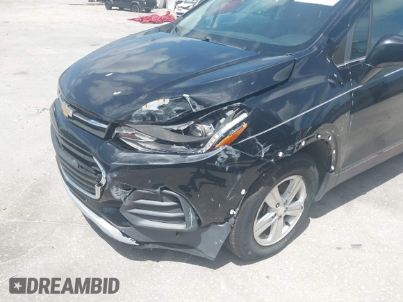 2018 Chevrolet Trax LT with VIN 3GNCJLSB9JL276974, listed as a IAAI auction lot 41959303 with 59,686 mi miles and . Bid and sale history available at carsss.com. Image 6.