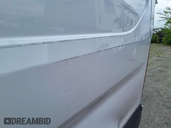 2016 Ford Transit Cargo with VIN 1FTYE1ZM1GKA06047, listed as a IAAI auction lot 42679265 with 124,601 mi miles and . Bid and sale history available at DreamBid. Image 24.