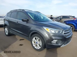 2017 Ford Escape SE z VIN 1FMCU0GD1HUF08682, wystawiony jako IAAI lot #41703106 z przebiegiem 69 407 mil mil oraz . Historia ofert i sprzedaży dostępna na DreamBid. Obrazek 1.