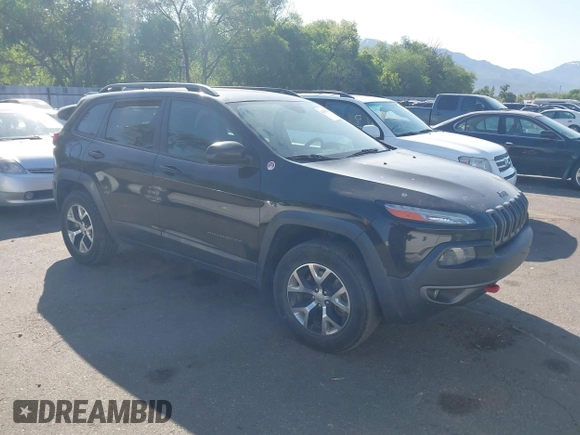2015 Jeep Cherokee Trailhawk with VIN 1C4PJMBS4FW556822, listed as a IAAI auction lot 42412874 with 129,865 mi miles and . Bid and sale history available at DreamBid. Image 1.