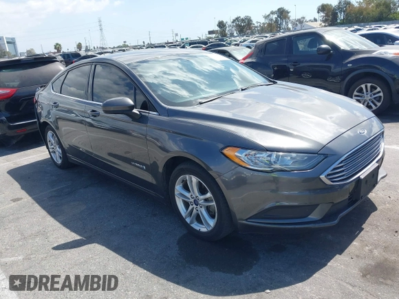2018 Ford Fusion Hybrid SE with VIN 3FA6P0LU4JR261594, listed as a IAAI auction lot 40360797 with 128,533 mi miles. Bid and sale history available at carsss.com. Image 1.