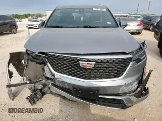 2024 Cadillac XT6 FWD Luxury with VIN 1GYKPAR41RZ700452, listed as a Copart auction lot 57675945 with 27,449 mi miles and Salvage title. Bid and sale history available at DreamBid. Image 5.