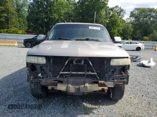 2004 Chevrolet Suburban LT z VIN 1GNEC16Z34J242670, wystawiony jako Copart lot #60987725 z przebiegiem 277 961 mil mil oraz Szkoda całkowita • Salvage title. Historia ofert i sprzedaży dostępna na DreamBid. Obrazek 5.