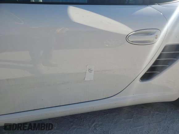 2007 Porsche Boxster S z VIN WP0CB29837U730970, wystawiony jako Copart lot #77829184 z przebiegiem Nie podano mil oraz Szkoda całkowita • Salvage title. Historia ofert i sprzedaży dostępna na DreamBid. Obrazek 12.