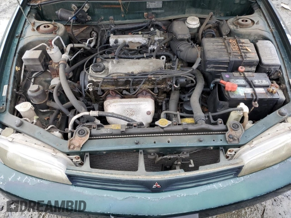 1998 Mitsubishi Mirage DE z VIN JA3AY26A2WU042095, wystawiony jako Copart lot #84700394 z przebiegiem 124 362 mil mil oraz Czysty tytuł • Clean title. Historia ofert i sprzedaży dostępna na DreamBid. Obrazek 11.