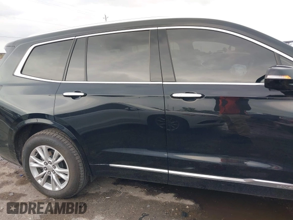 2023 Cadillac XT6 FWD Luxury z VIN 1GYKPAR43PZ147512, wystawiony jako IAAI lot #42175720 z przebiegiem 31 520 mil mil oraz . Historia ofert i sprzedaży dostępna na DreamBid. Obrazek 14.