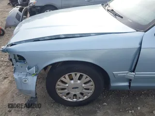 2003 Ford Crown Victoria LX z VIN 2FAFP74W83X180076, wystawiony jako IAAI lot #41744980 z przebiegiem 254 465 mil mil oraz . Historia ofert i sprzedaży dostępna na DreamBid. Obrazek 18.